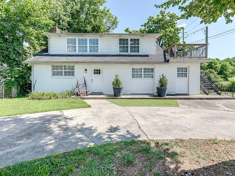 Front of house with parking.