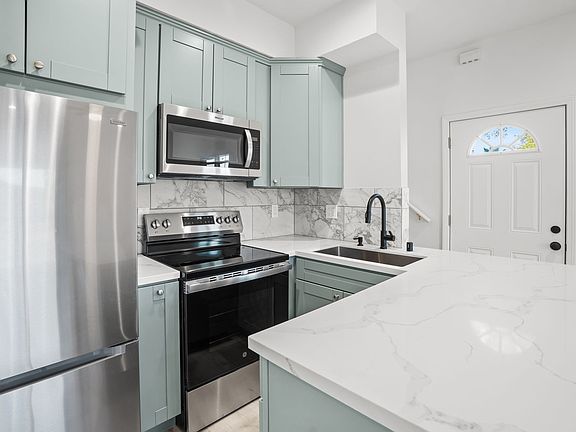 Updated kitchen with stainless steel appliances