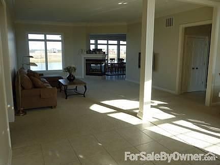 Great Room
						:
						Spacious, open great room with 3-way fireplace