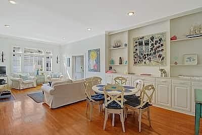 Living Room with additional dining area, cathedral ceilings