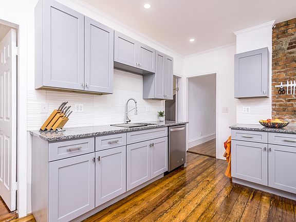 View of kitchen leading into the living room