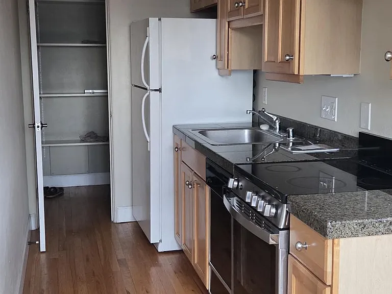 Full kitchen with new stove, dishwasher and huge pantry.