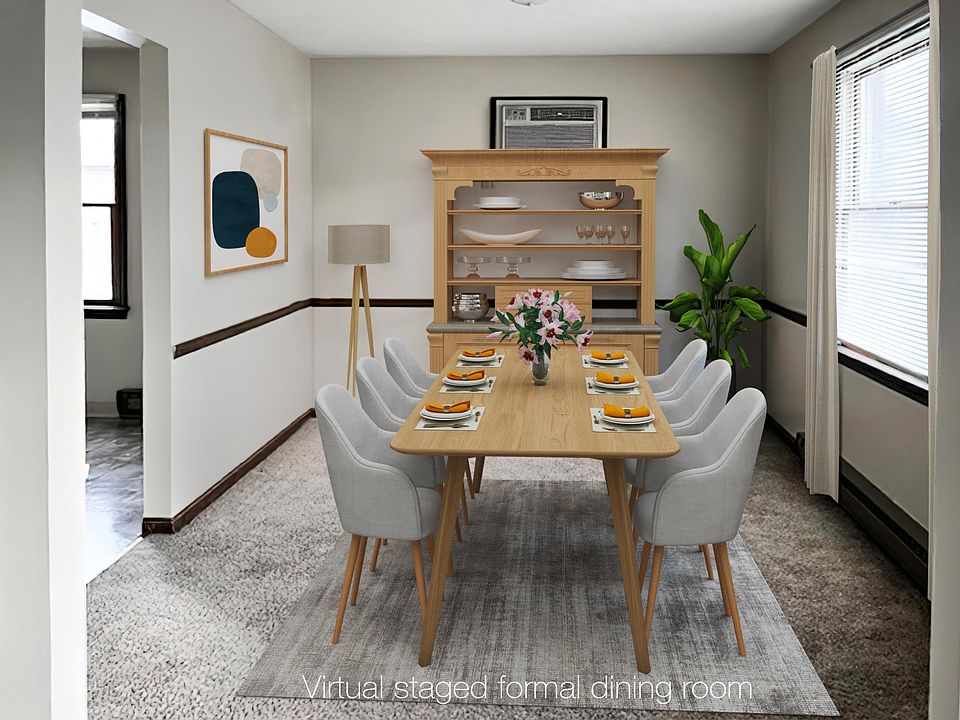 The formal dining room could be a large home office.