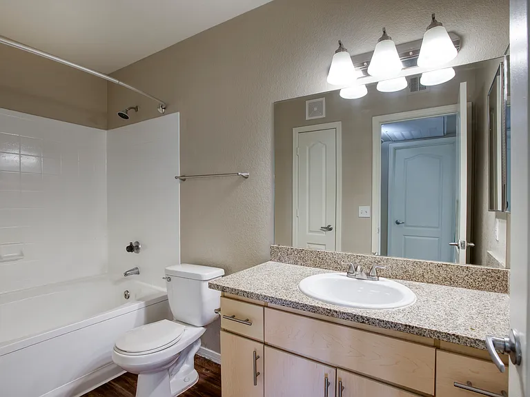 Bright bathrooms made for daily ease.