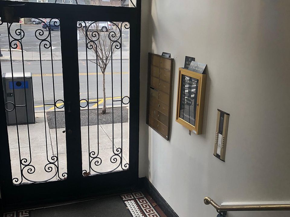 mailboxes, visitor buzzer, exterior door locked at night. during the day packages get dropped in the interior foyer