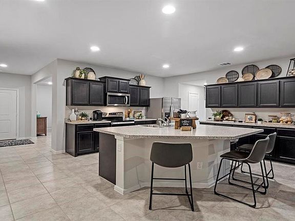 All photos shown here may not depict the specified home & features included are for illustration purposes only