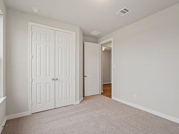 Your secondary bedroom features an oversized closet.