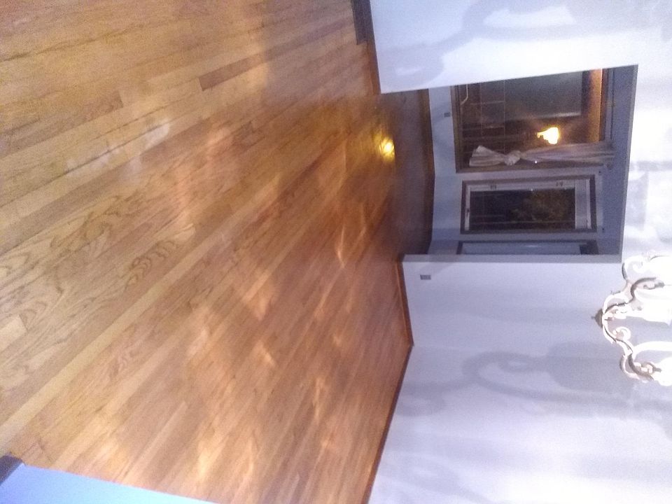 Formal living room leading a lovely bright sunroom