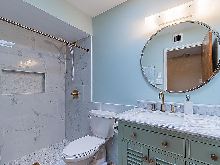 Updated bathroom with tiled shower