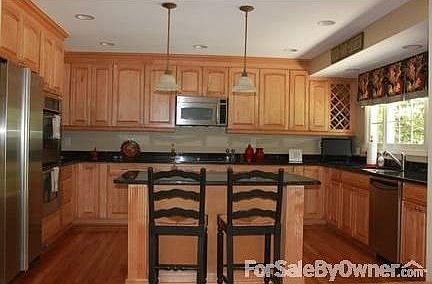 Kitchen
						:
						Granite countertops, stainless steel appliances