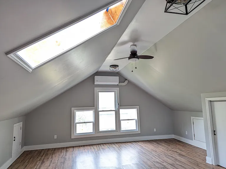 Huge attic bedroom with skylight