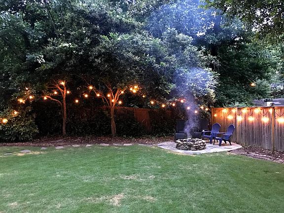 Back yard with fire-pit.