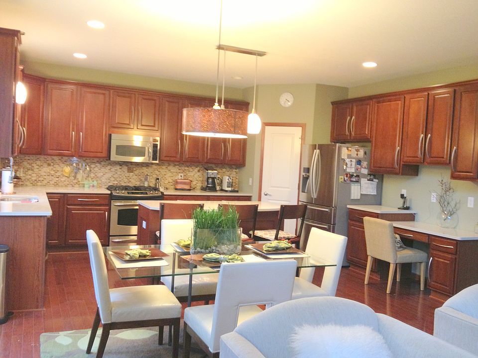 Cherry cabinets, Quartz counters and Onyx backsplash