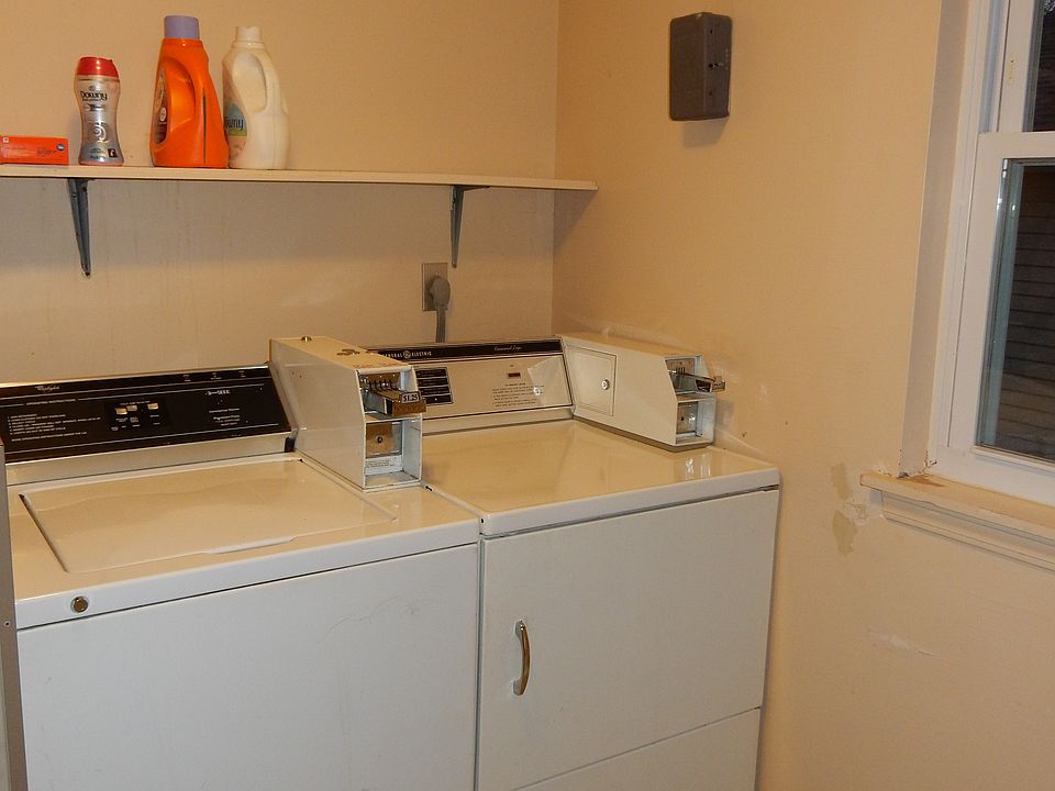coin operated washer/dryer, shared.