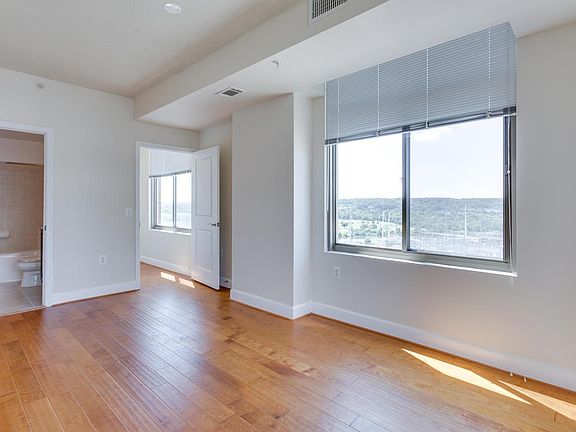 Spacious bedroom with large windows