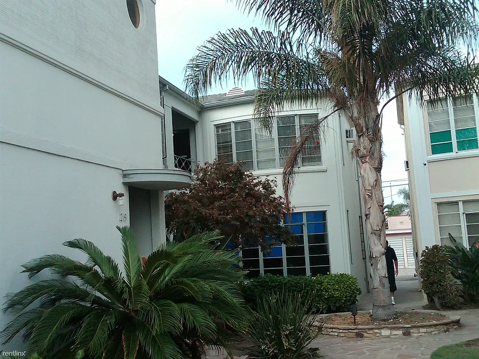 Courtyard and entrance on left to 1219 A, B and C