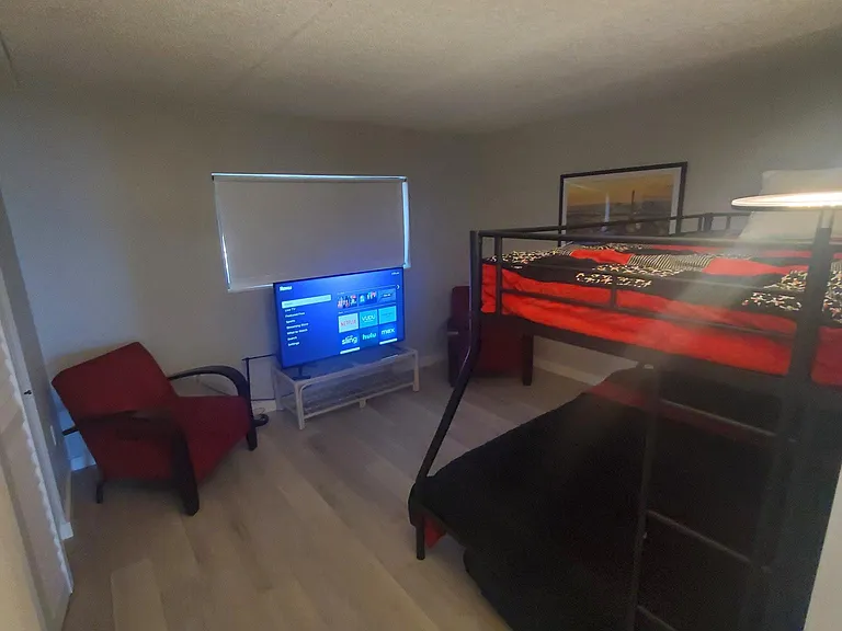3 beds (full, twin, twin) 2 large closets and 65 inch smart tv