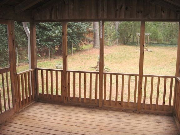 Serenity rules on this private screened porch.