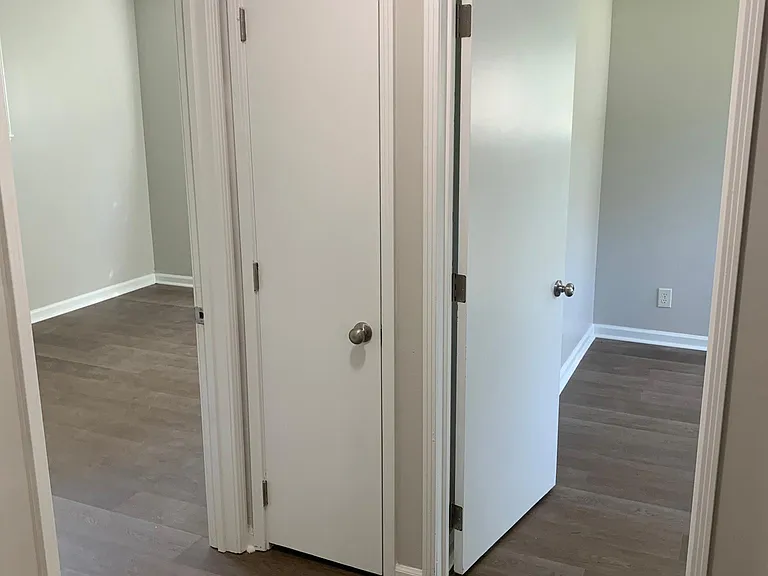 Hallway that leads to bedrooms