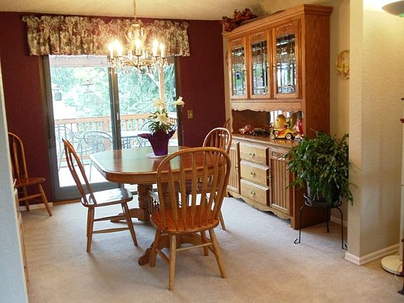 Newly refinished cabinets with additional cabinet and retractable eating area