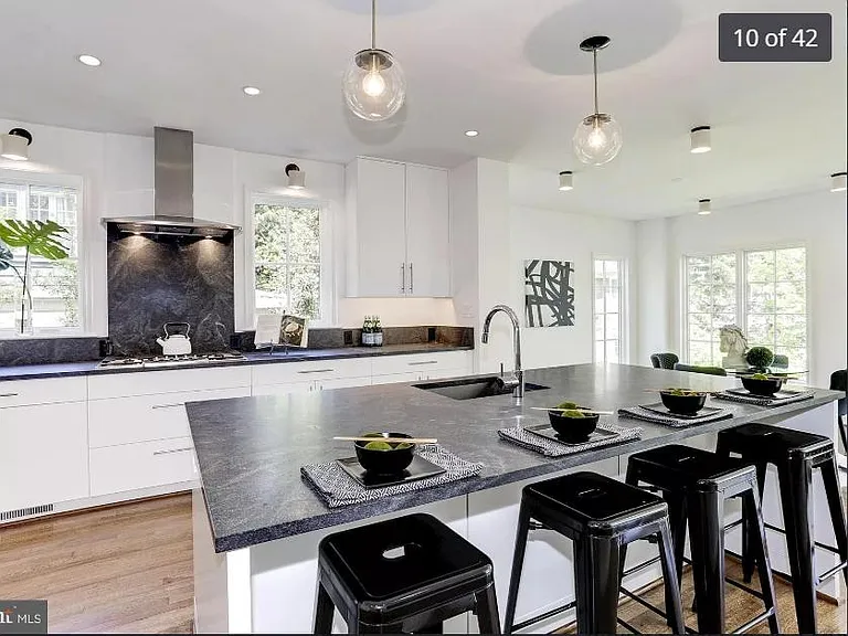 Modern kitchen with stainless steel appliances and ample storage