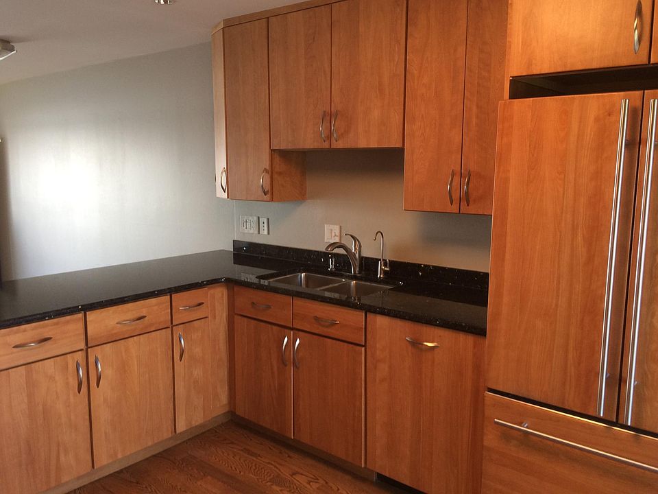 Granite countertops and breakfast bar. 