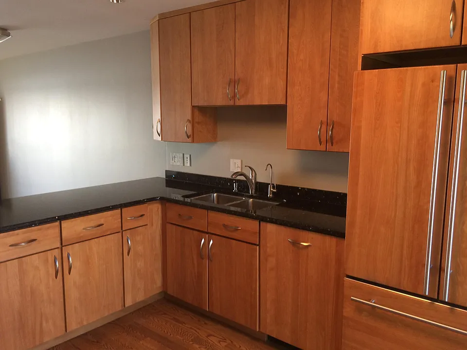 Granite countertops and breakfast bar. 