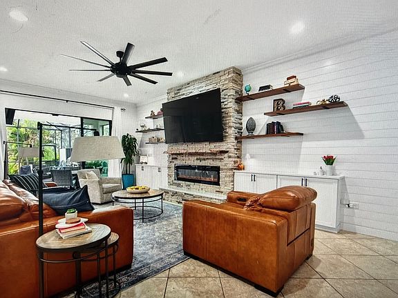 Living room with fireplace and storage