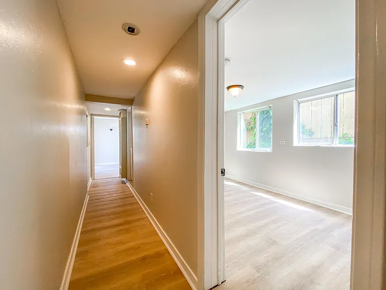 Come out of bedroom 1 and head to the laundry room.
