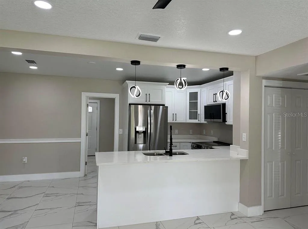 Building Photo - 5008 N Tampania Ave