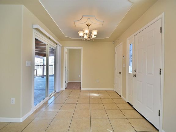 View of the entry. Please notice the attractive ceiling design