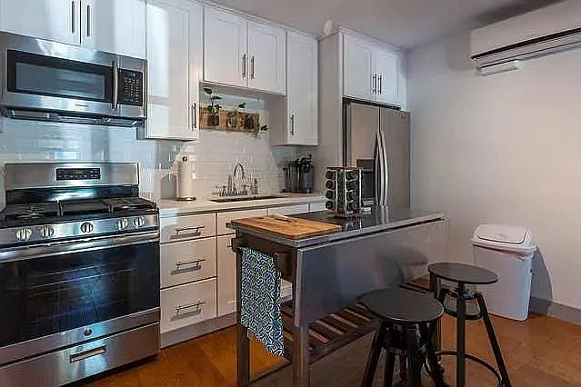 6820 1/2 Iris Cir — Photo 43