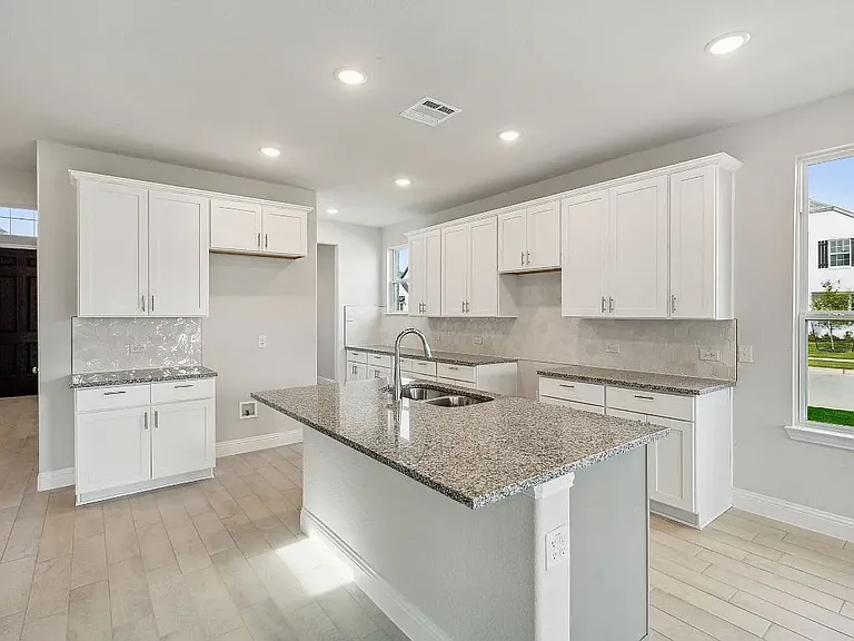 Kitchen *Representative Builder Photo _ Actual finishes may vary.