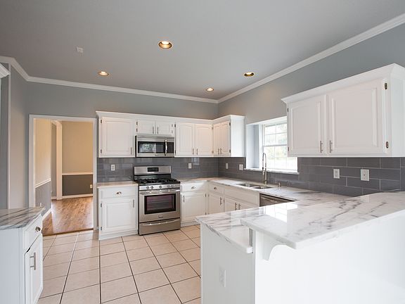 Completely updated kitchen with new granite, appliances and fixtures