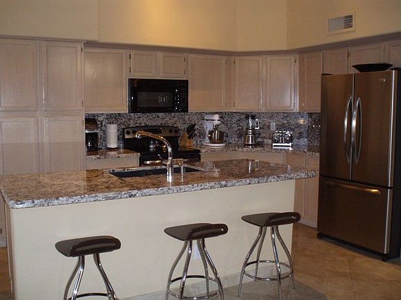 Kitchen has Granite Countertops and Full Backsplash 