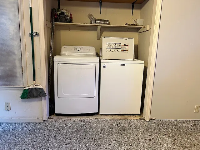 Electric Washer and Gas dryer located in Garage