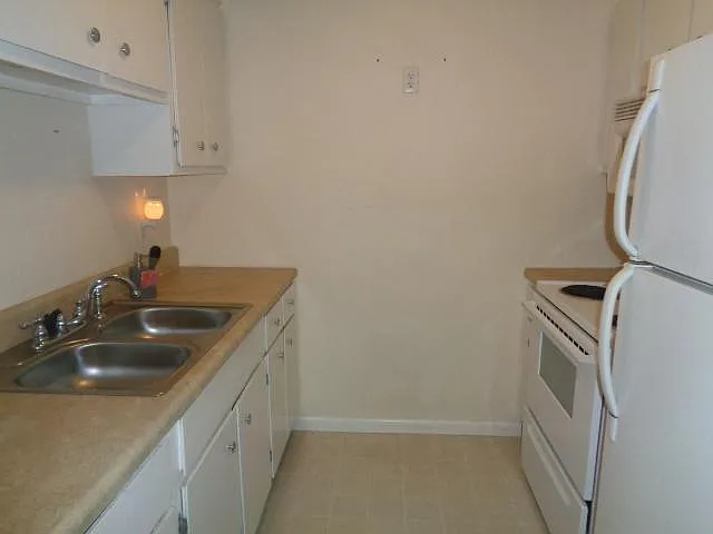 Galley Kitchen
Range and Refrigerator