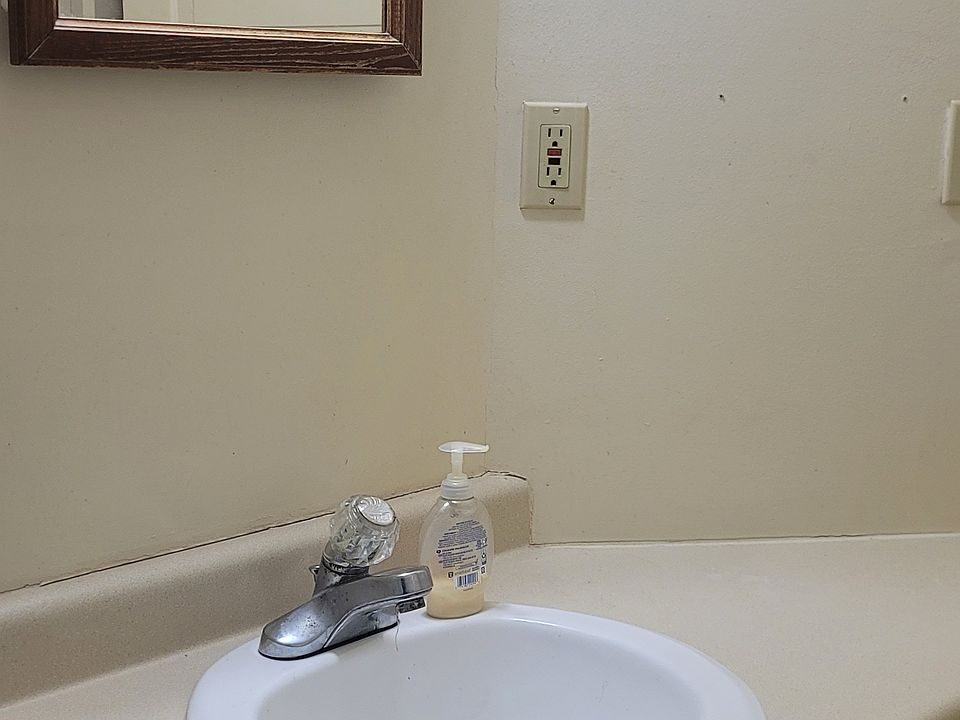Full bath showing vanity and medicine cabinet.