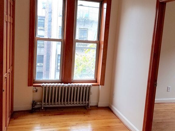 4th image of 80 E 7th St APT 4A