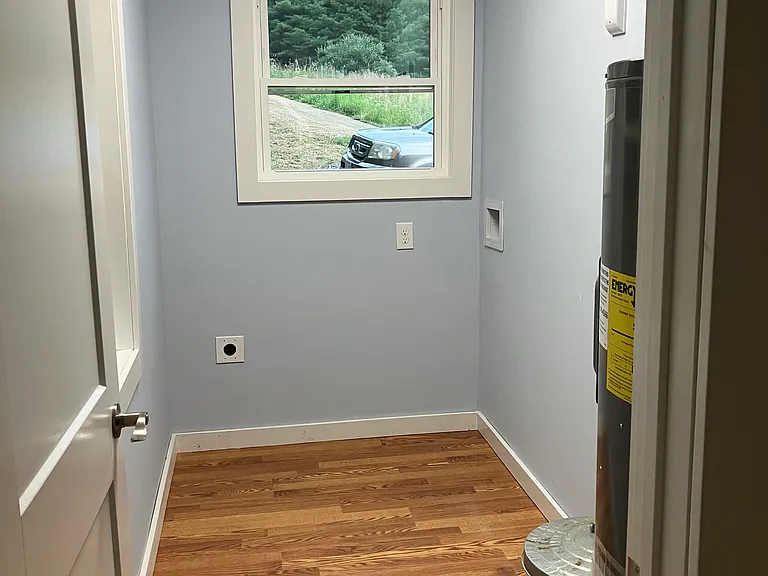 Utility room with washer & dryer hook ups
