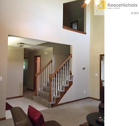 Entry - Stiarwell overlooks living room