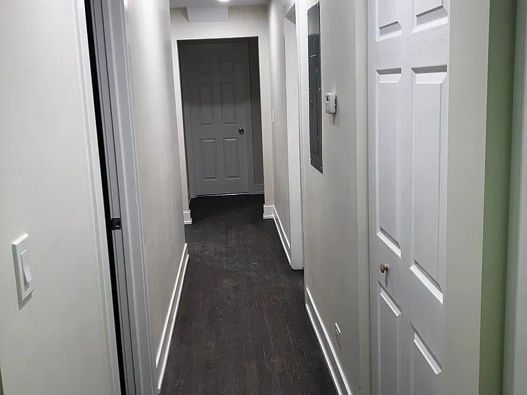Hallway to bedrooms laundry Kitchen
