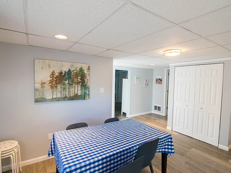 Dine-in kitchen. Stacked washer/dryer is in the closet area.