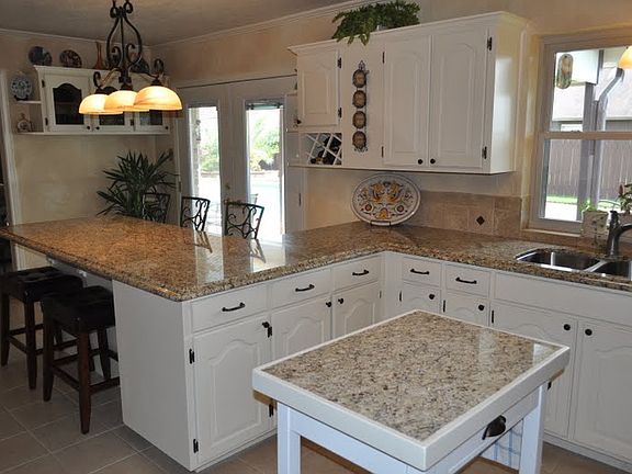 Kitchen Bar- updated cabinets, stove, dishwasher, garbage disposer