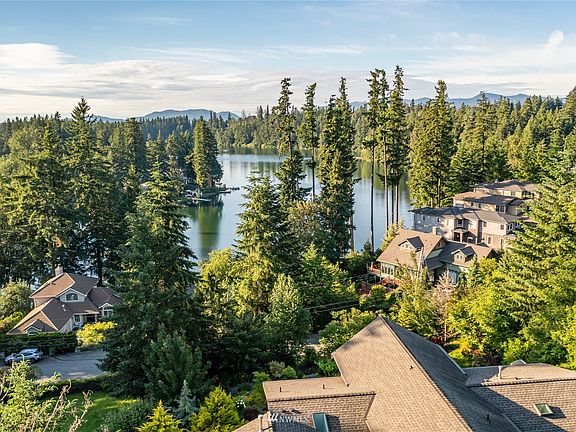 Lake Wilderness and Squak Mountain Views! Privacy, no HOA and quick access to the lake, park, library and shopping.
