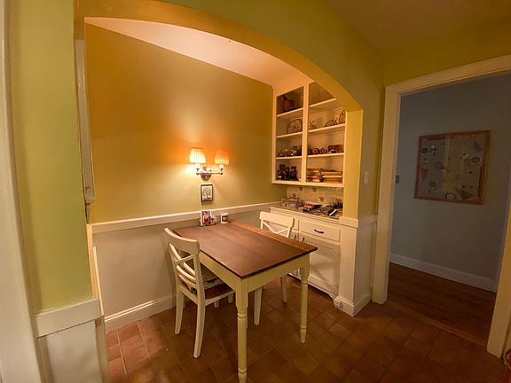 Breakfast nook with built-in shelving