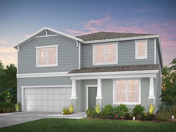 The Valencia, a two-story family home with a 2 car garage, shown in Home Exterior 7