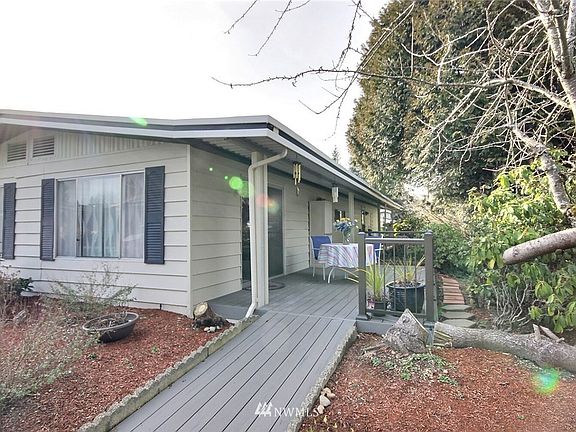 This unit has an updated composite deck with wheel chair ramp and metal railing. The entire interior of this home also boasts waterproof vinyl plank flooring, which is easy to navigate with a wheel chair. 
