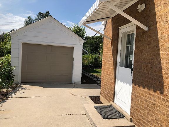 Garage with door opener.