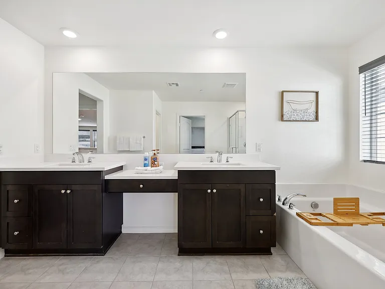 Elevate your stay with luxury in the bathroom w/ a his & her vanity space